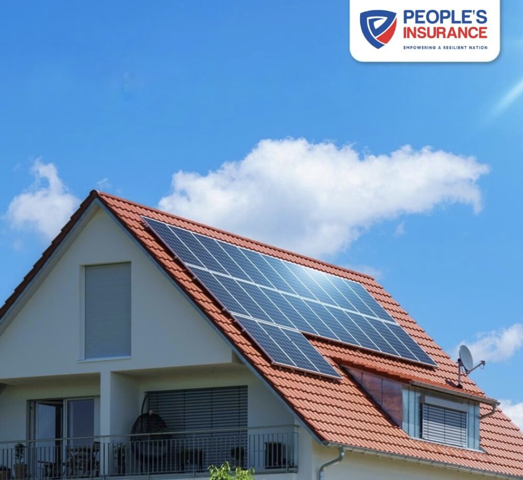 Comprehensive Coverage for Solar Panels: Secure Your Solar Energy Investment with People’s Insurance 8 Peoples Insurance Modern residential house with rooftop solar panels under a clear blue sky, promoting renewable energy and home insurance protection.