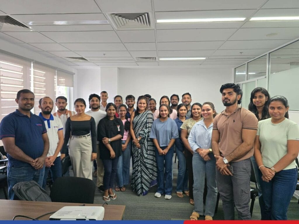 Building Professional Excellence Through Effective Communication 4 Peoples Insurance Building professional excellence through effective communication as participants gather for a group photo after a corporate training session